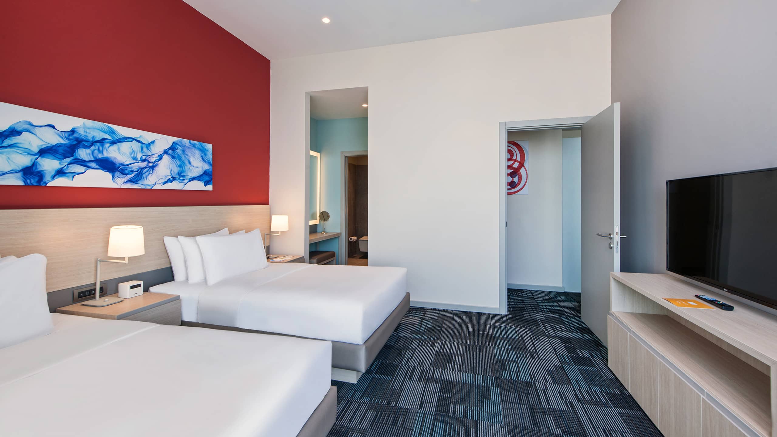 One Bedroom Suite with 2 Twin Beds a Kitchenette and a Sofabed - Image 1